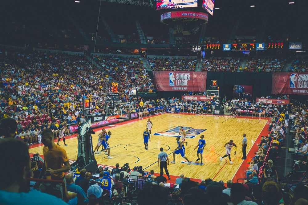 Packed basketball arena during a live professional game
